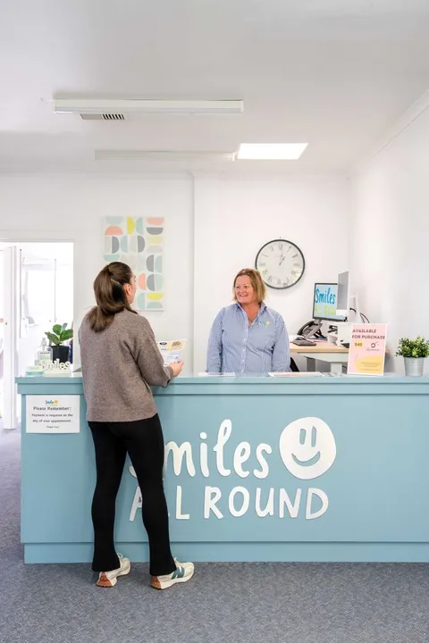 Jess and Ellie at the Smiles All Round reception desk