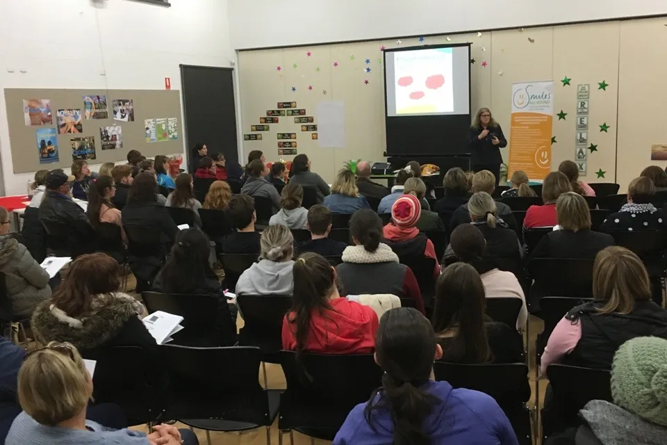A Smiles All Round workshop being presented to a group in Keith