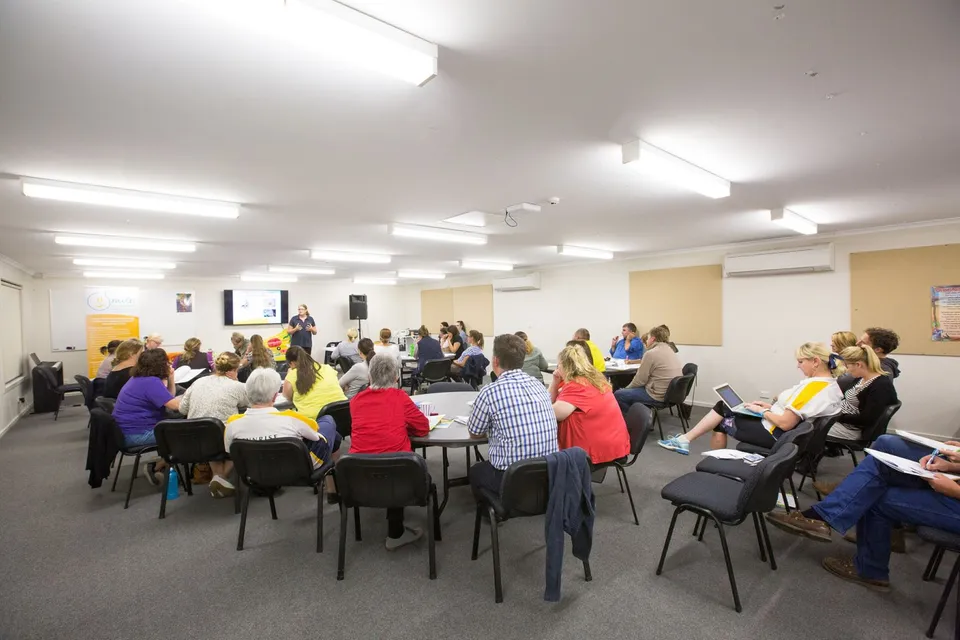 Smiles All Round delivering a workshop presentation to educators and support staff